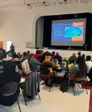 an audience at a presentation on Equity-Guided Public Health Ecosystems