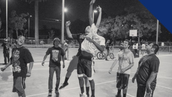 youth playing basketball