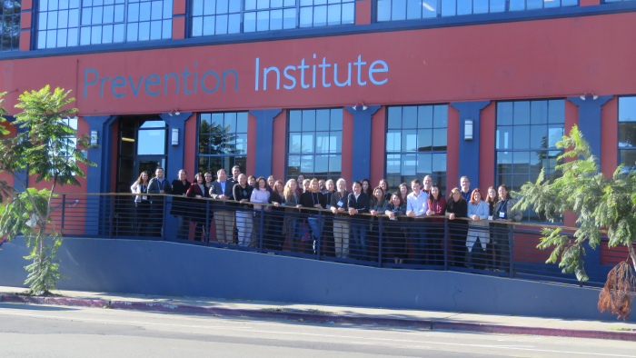 Intersections Initiative partners and Prevention Institute staff gather outside the Prevention Institute office building.