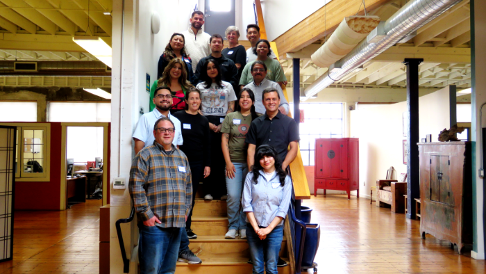 Local partners pose on the stairs at Prevention Institute's Oakland HQ